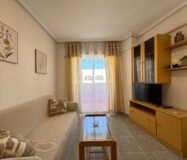 Квартира у моря в Торревьехе 57 кв.м с террасой и бассейном