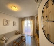 Квартира у моря в Торревьехе 57 кв.м с террасой и бассейном