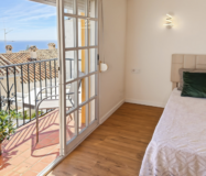 Великолепний таунхаус з терасою та видом на море в Бенальмадені