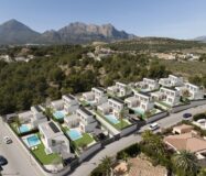 Виллы в Альфас-дель-Пи с бассейном и террасами 227 кв.м